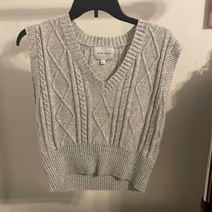 grey sweater vest